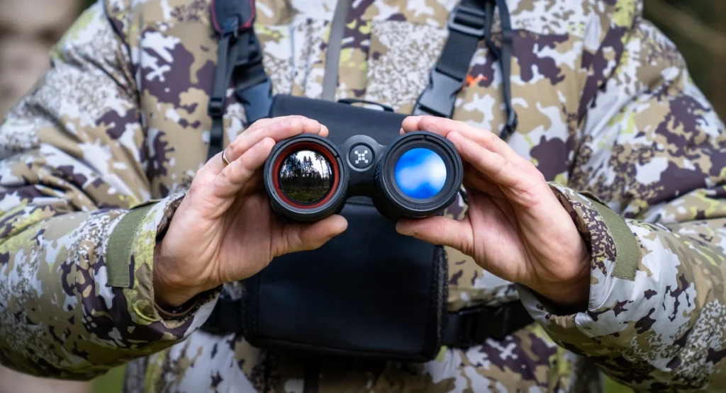 QUEST thermal binoculars real usage scene with professional hunter